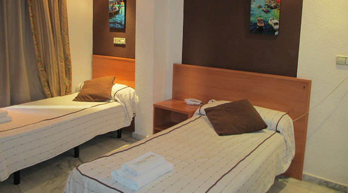 Hotel New Sanz - Hotel - Habitaciones - Triple Matrimonial